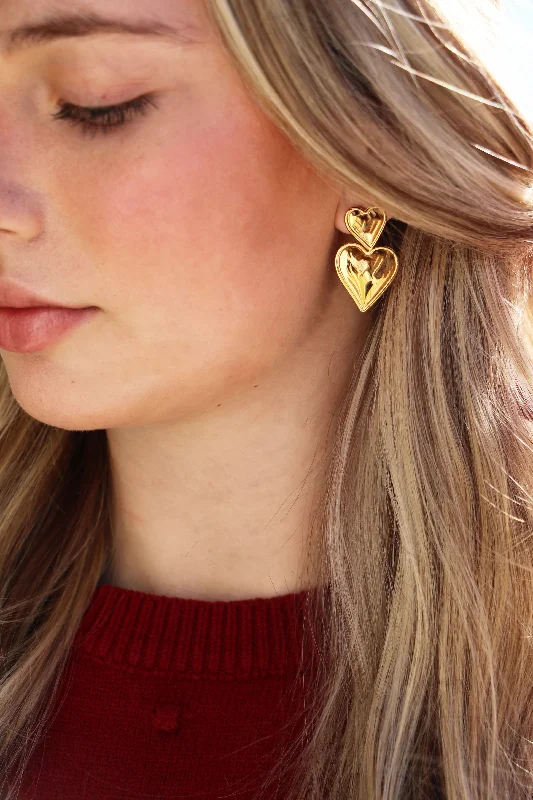 women gold stud earrings -stacked heart earrings { gold }