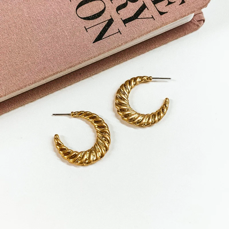 women emerald-cut earrings -Twist of Fate Twisted Hoop Earrings in Gold Tone