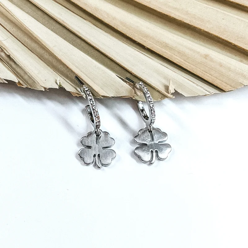 women sterling silver earrings -Small Crystal Hoop Earrings with Hanging Four Leaf Clover Charm in Silver Tone