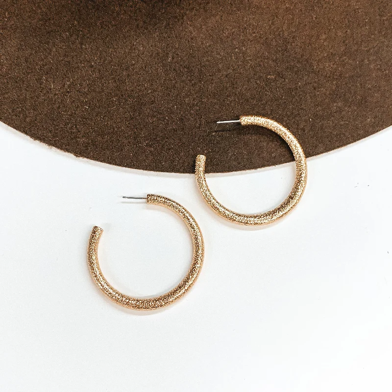 Stud earrings for women -Textured Large Sized Hoop Earrings in Gold