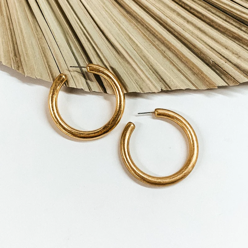 women oversized earrings -Clean Slate Large Hoop Earrings in Worn Gold Tone