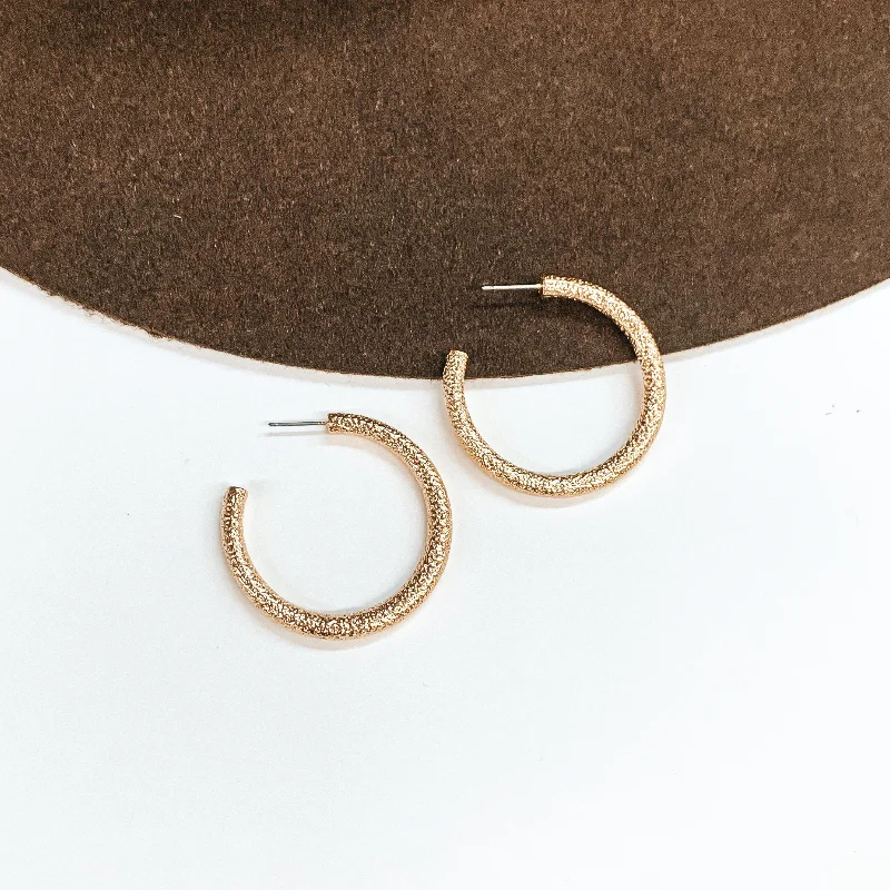 women silver hoop earrings -Textured Medium Sized Hoop Earrings in Gold